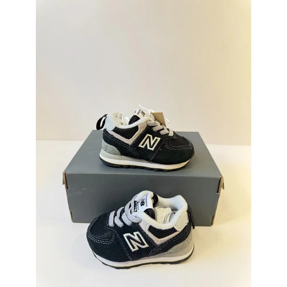 New Balance Kid's 574 Core Bungee Sneaker, Black/White, 2 W Infant (0-12 Months)
